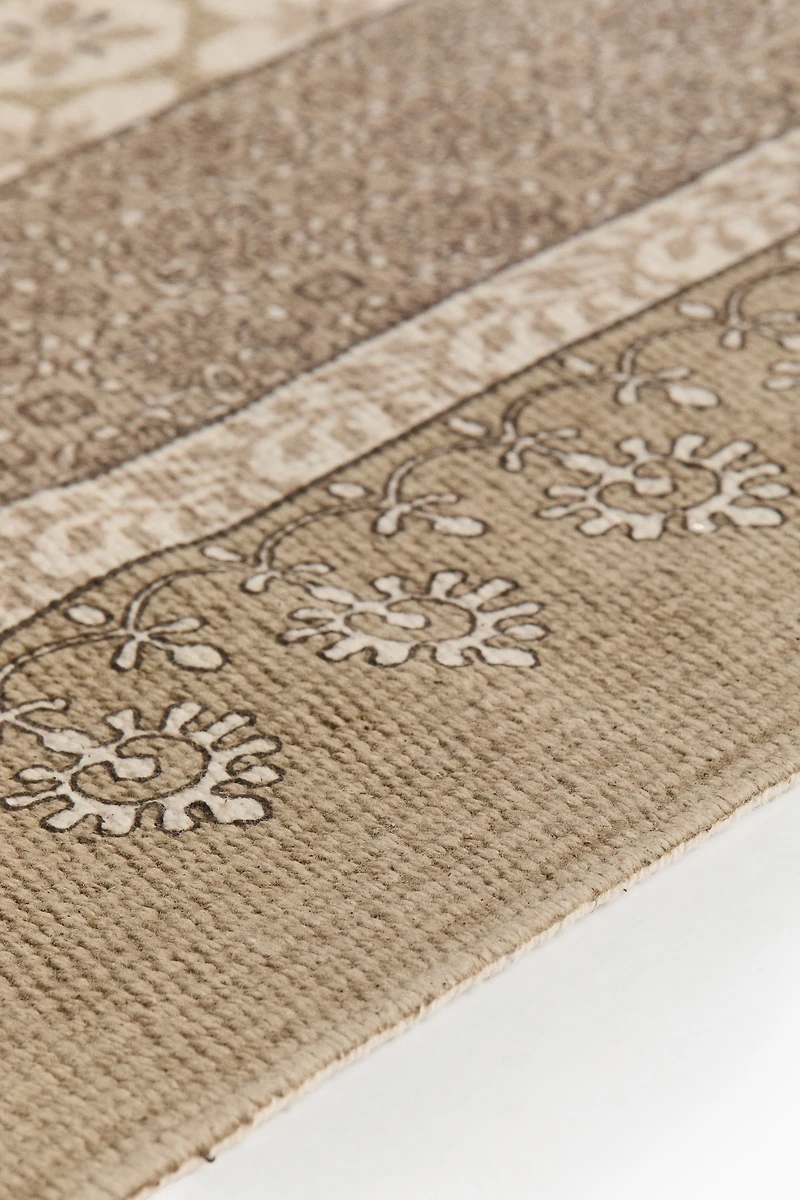 Patterned Rug with Fringe