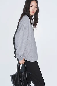 Haut à encolure ras-du-cou