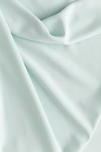 Robe asymétrique à encolure bénitier