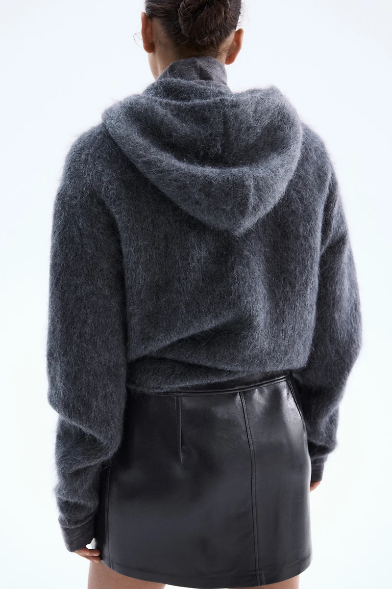 Jupe en tissu enduit avec fermetures éclair