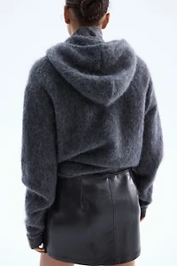 Jupe en tissu enduit avec fermetures éclair