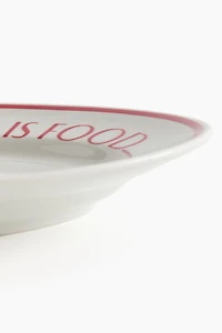 Assiette de service en porcelaine