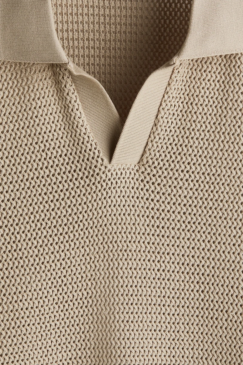 Polo classique en tricot ajouré