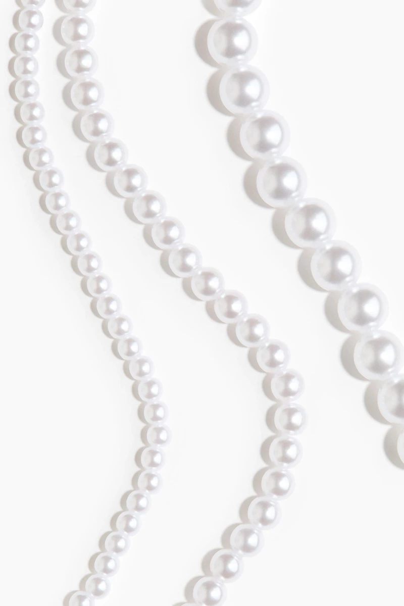 Collier de perles fantaisie à trois rangs