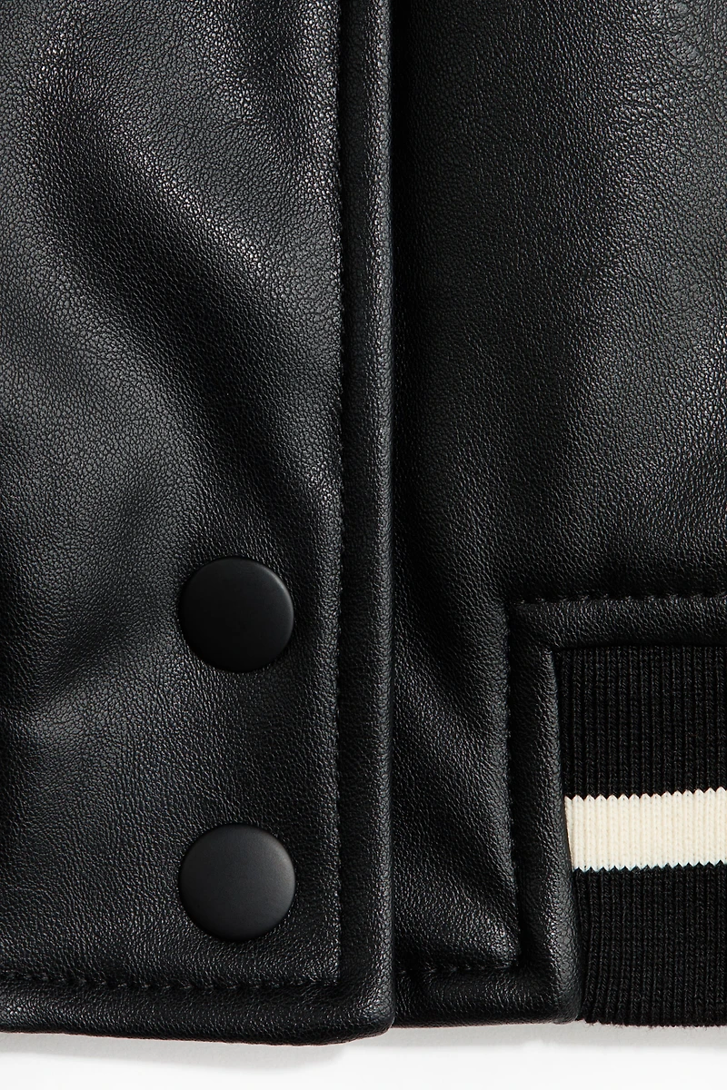 Coated bomber jacket