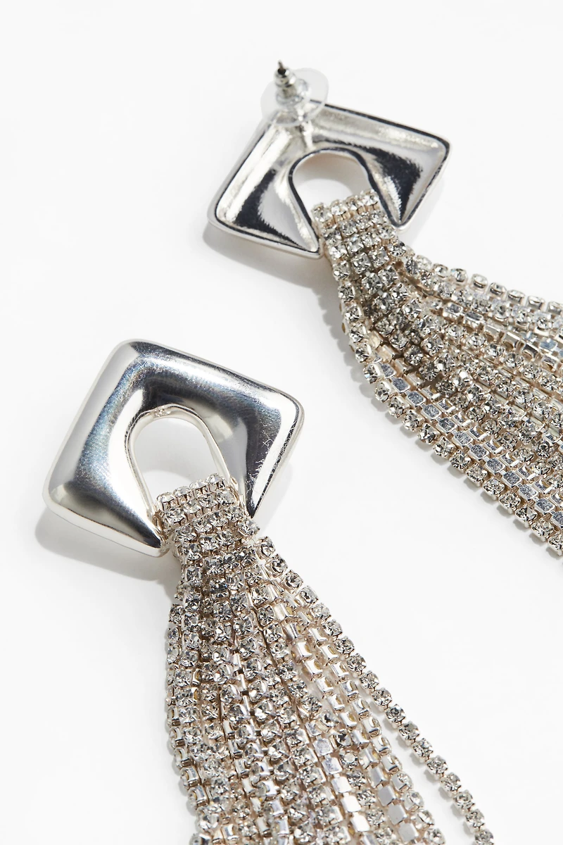 Longues boucles d'oreilles avec chaînes à strass