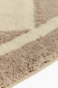 Tapis à motif arlequin en laine mélangée