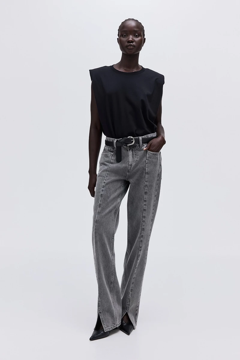 Jean avec fente en bas de jambe