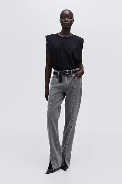 Jean avec fente en bas de jambe