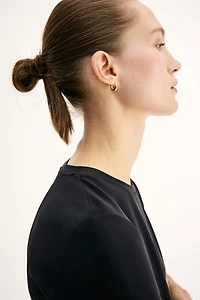 Haut péplum en interlock