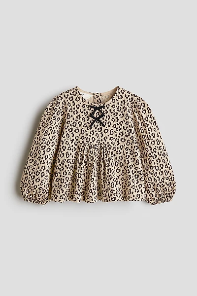 Blouse froissée avec boucle