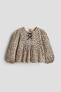 Blouse froissée avec boucle
