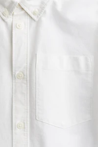 Chemise en coton avec col à pointes boutonnées
