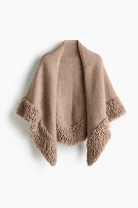 Cape en tricot
