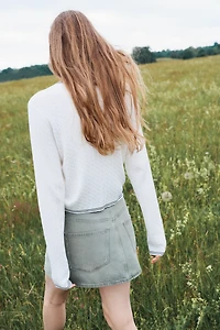 Gilet en tricot torsadé