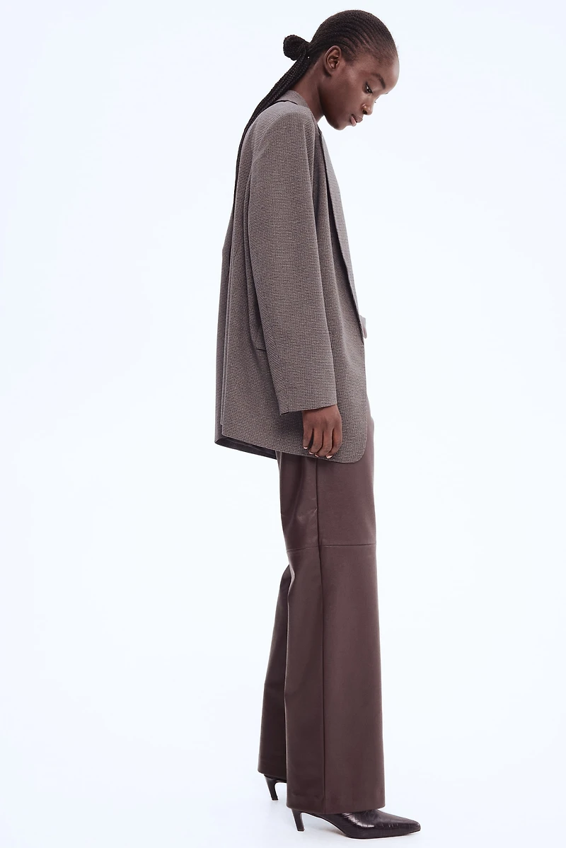 Pantalon à jambes droites en tissu enduit