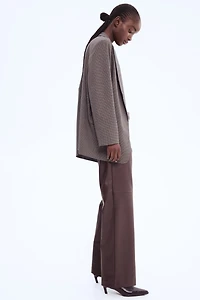 Pantalon à jambes droites en tissu enduit