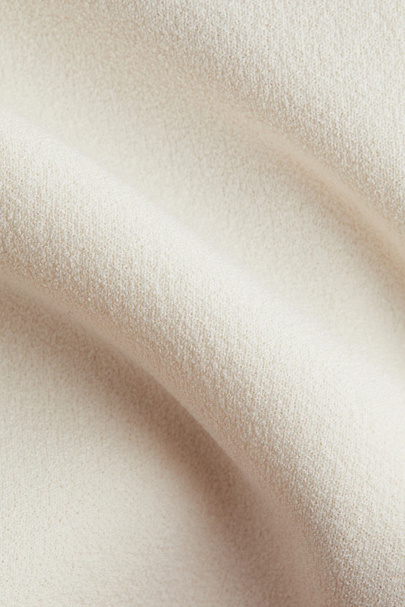 Sleeveless Peplum Top