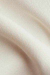 Sleeveless Peplum Top