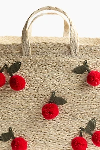 Grand panier en jonc de mer avec pompons