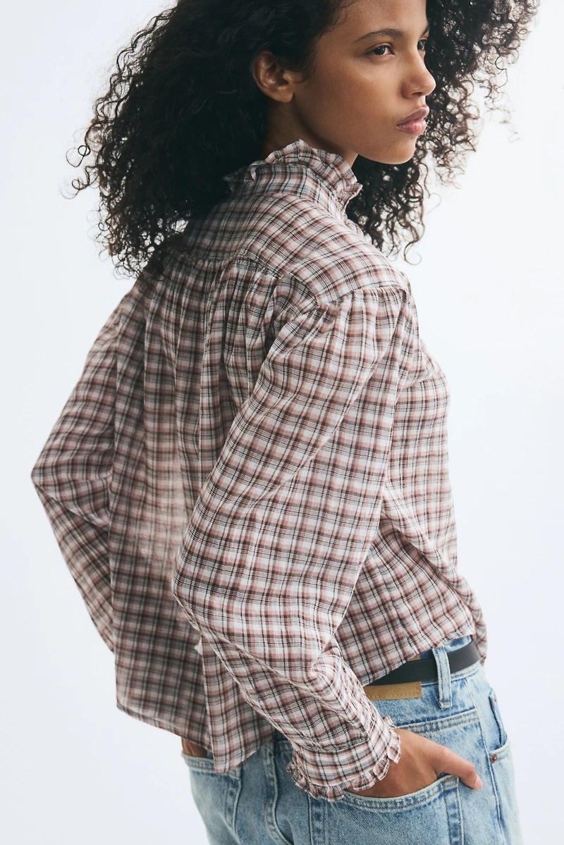 Blouse à volants plissés