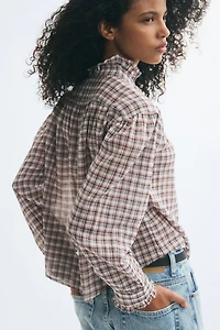 Blouse à volants plissés
