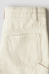 Short menuisier