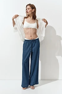 Pantalon taille froncée avec ceinture à nouer