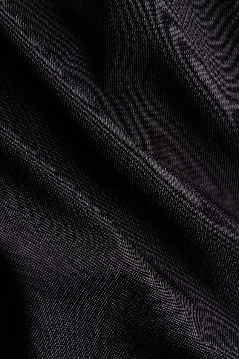 Haut asymétrique à effet drapé