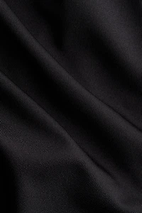 Haut asymétrique à effet drapé