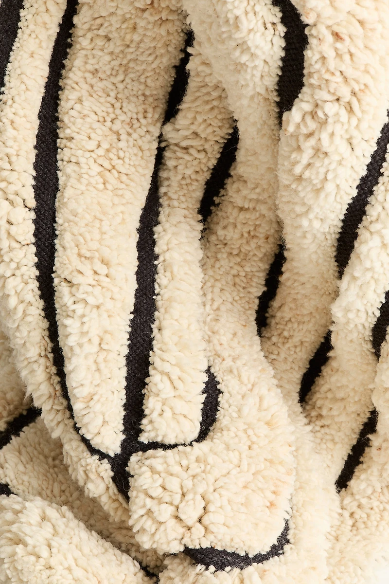 Tapis à franges en laine mélangée