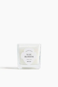 Petite bougie parfumée dans un pot en verre