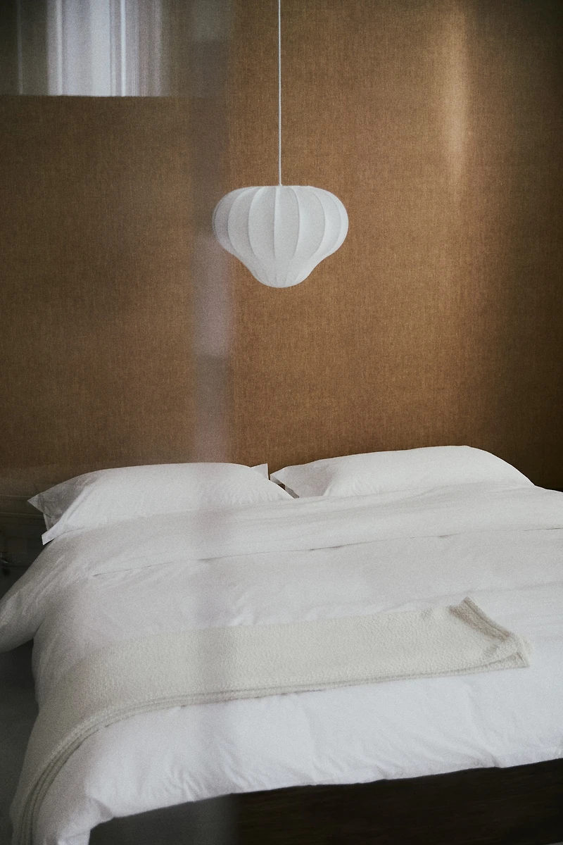 Lampe suspendue habillée de textile