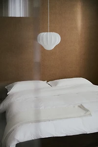 Lampe suspendue habillée de textile