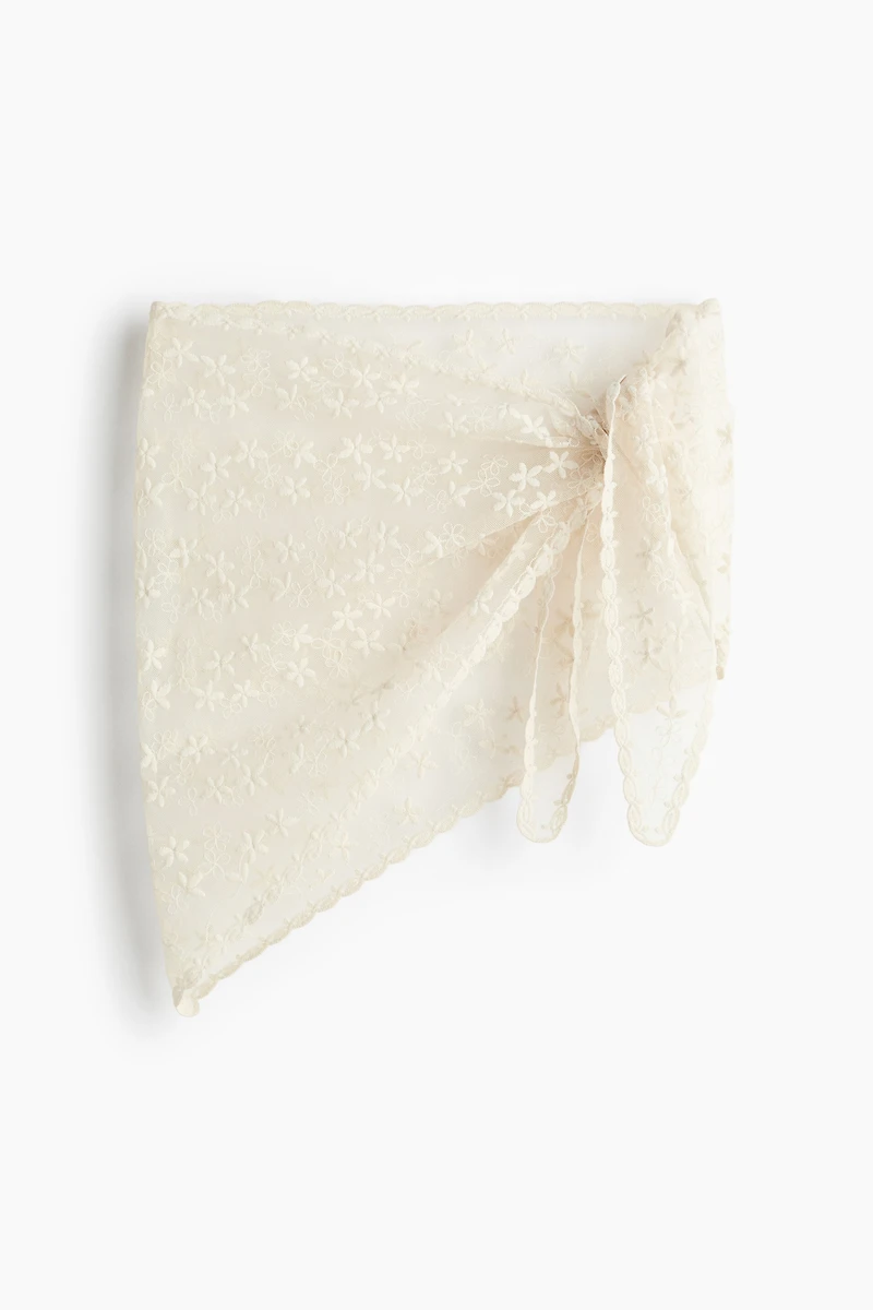 Foulard de hanches en filet brodé