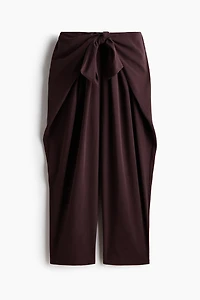 Pantalon à jambes tonneau avec détail nouer