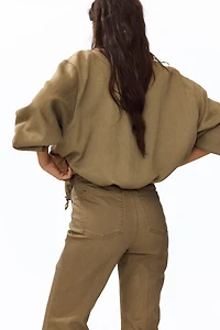 Flared ankle-length trousers