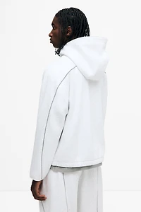 Veste à fermeture éclair ample avec capuchon