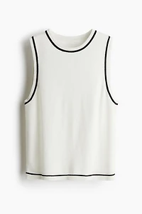 Chandail sans manches en fin tricot