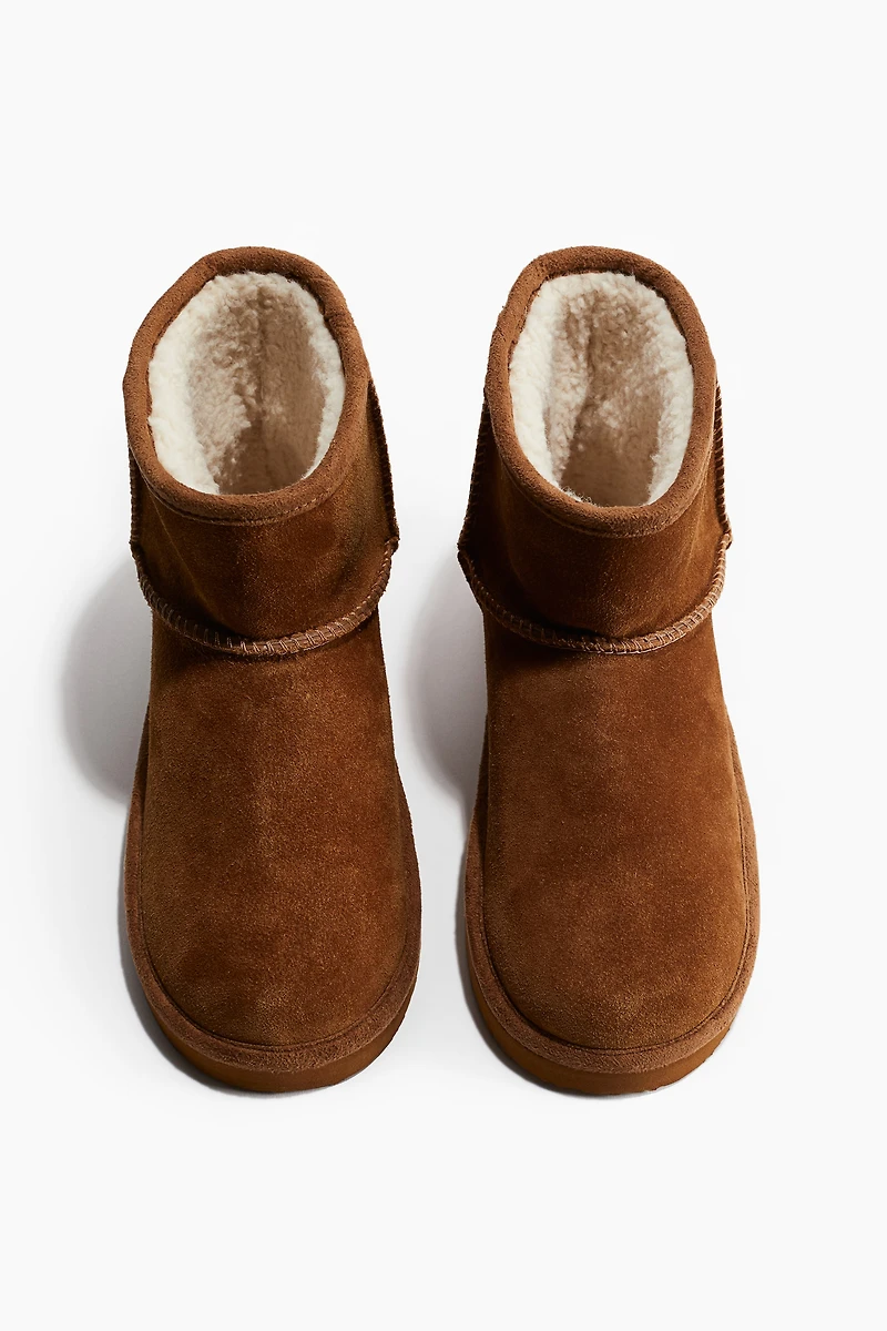 Bottines chaudement doublées en cuir velours