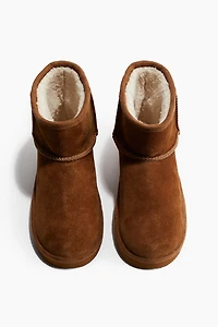 Bottines chaudement doublées en cuir velours
