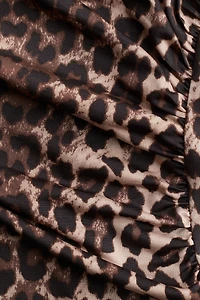 Robe moulante à effet drapé