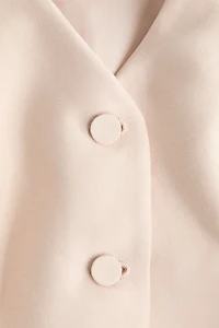 Chandail sans manches avec encolure en V et basque