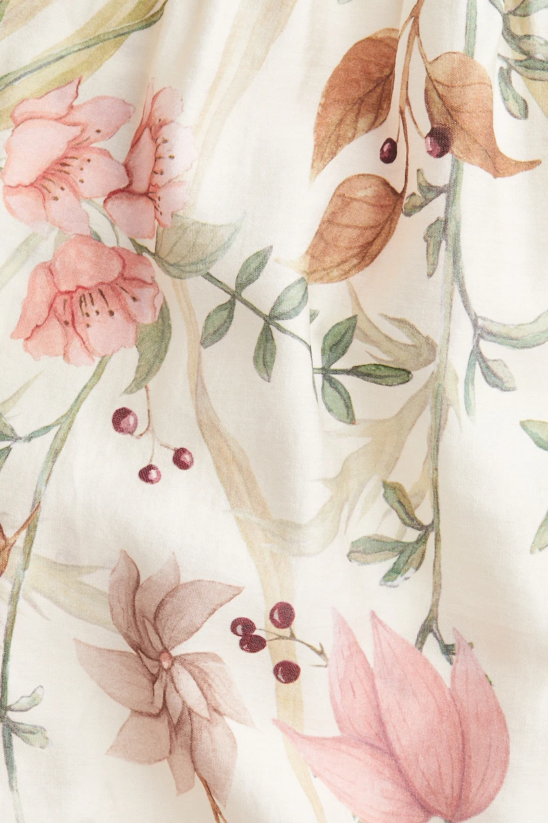 Blouse à poignets volantés