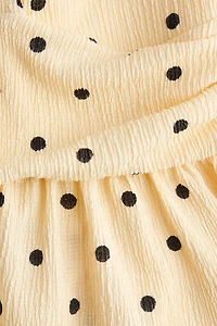 Haut péplum à dos nu