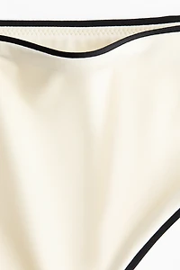 Culotte de bikini échancrée