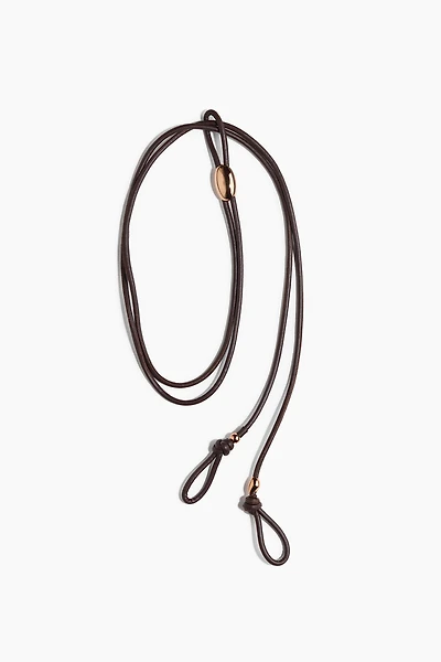 Ceinture en tissu enduit