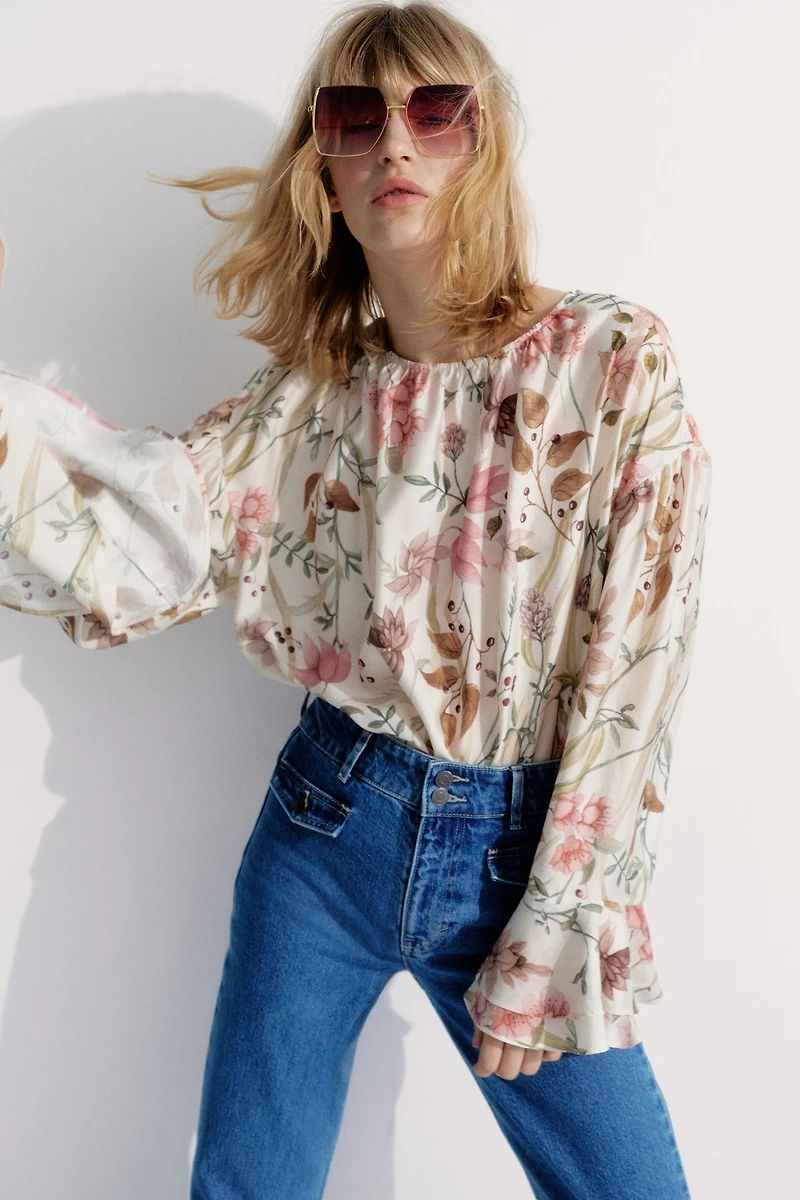 Blouse à poignets volantés