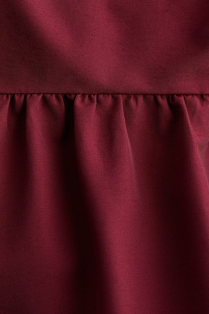 Tie-Detail Peplum Top