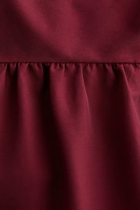 Tie-Detail Peplum Top